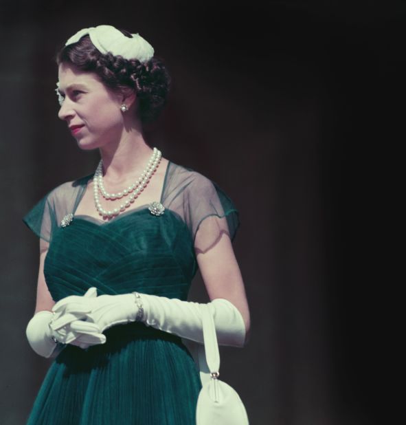 Queen Elizabeth II is photographed on the balcony of Melbourne's Government House during her tour of Australia in March 1954.