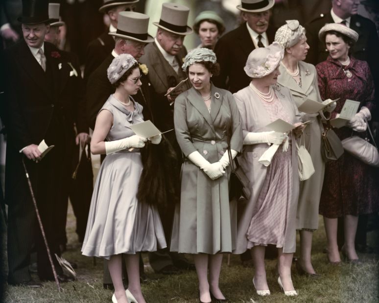 From left, Princess Margaret, Queen Elizabeth II and the Queen Mother visit Epsom Downs Racecourse in June 1958.