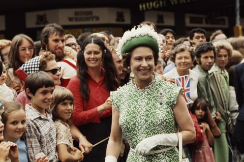 The Queen meets the crowds during her royal tour of New Zealand in 1977.