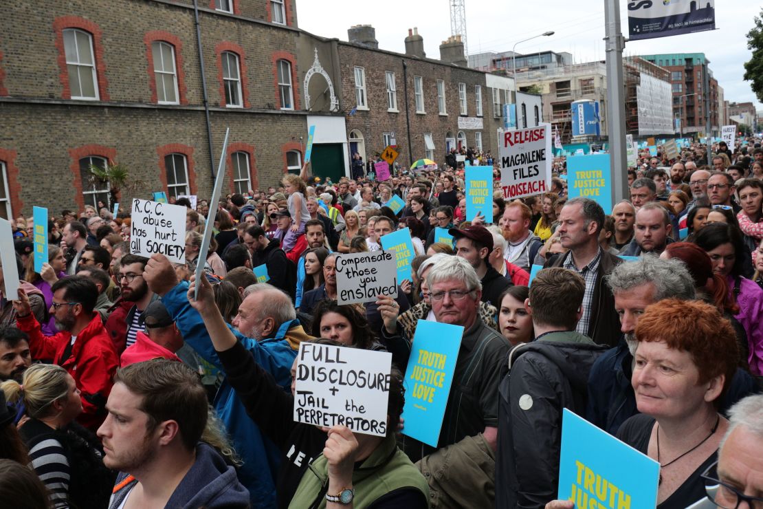 The Stand4Truth rally gathers outside a former Magdalene Laundry in Dublin as part of demonstrations against clerical abuse.