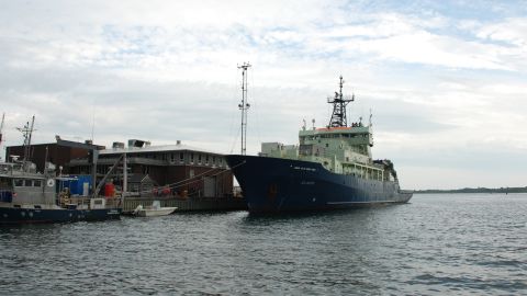 The R/V Atlantis docked at its home port at the Woods Hole Oceanographic Institution in Woods Hole, Massachusetts.