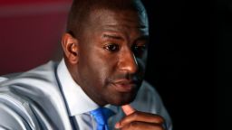 Democratic gubernatorial candidate Andrew Gillum listens as he meets with residents, Monday, Aug. 13, 2018, in the Liberty City neighborhood of Miami. Gillum spoke with residents about gun violence and quality of life in this inner city neighborhood. (AP Photo/Lynne Sladky)