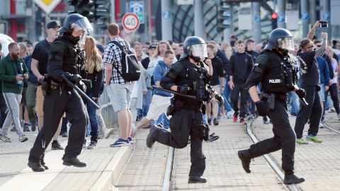 Riot police respond to a spontaneous protest in Chemnitz, eastern Germany, on Sunday.
