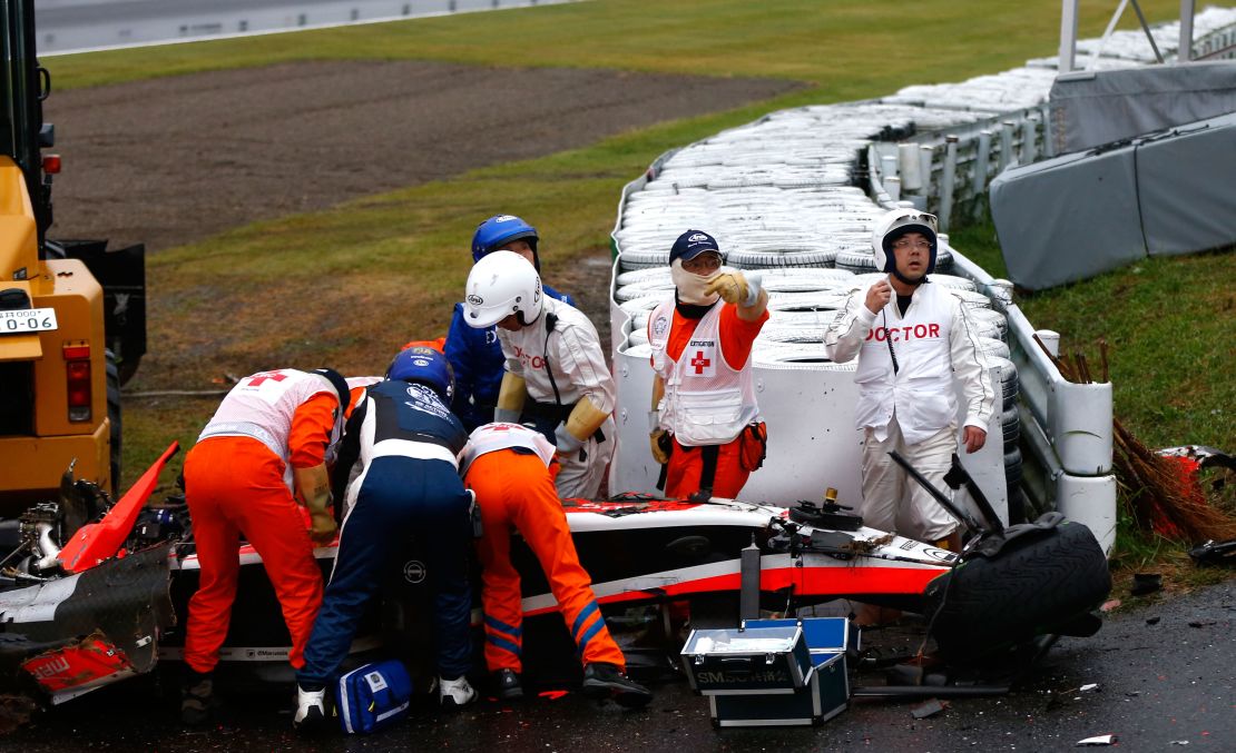 Jules Bianchi receives urgent medical treatment after crashing during the Japanese Grand Prix.