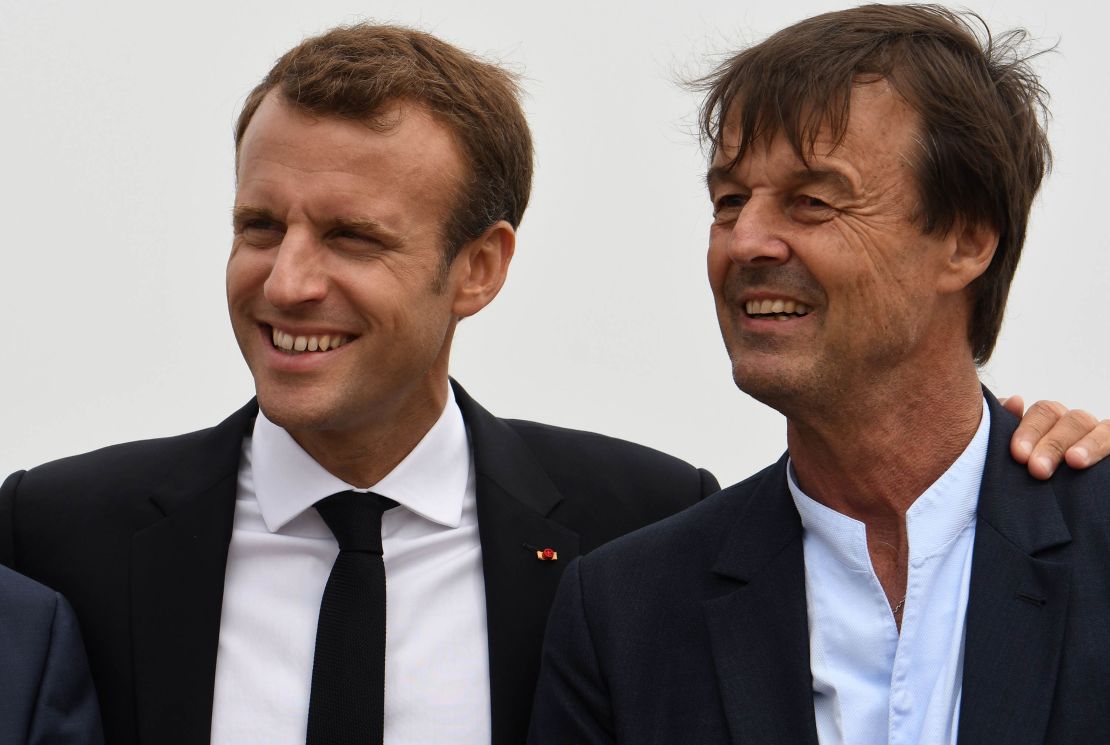 French president Emmanuel Macron (L) poses for photographs with Nicolas Hulot on June 20, 2018.