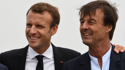 French president Emmanuel Macron (L) poses for photographs with Nicolas Hulot on June 20, 2018.
