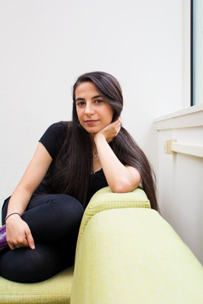 Connecticut college student Salma chose a verse from chapter 5 of the Quran to accompany her portrait. "As a Syrian this verse is very relevant to me since it has become the motto for self-sacrifice in order to save others," she told Guzman.
