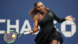 Serena Williams of the US hits a return to Magda Linette (out of frame) of Poland during their 2018 US Open Women's Singles match at the USTA Billie Jean King National Tennis Center in New York on August 27, 2018. (Photo by Don EMMERT / AFP)        (Photo credit should read DON EMMERT/AFP/Getty Images)