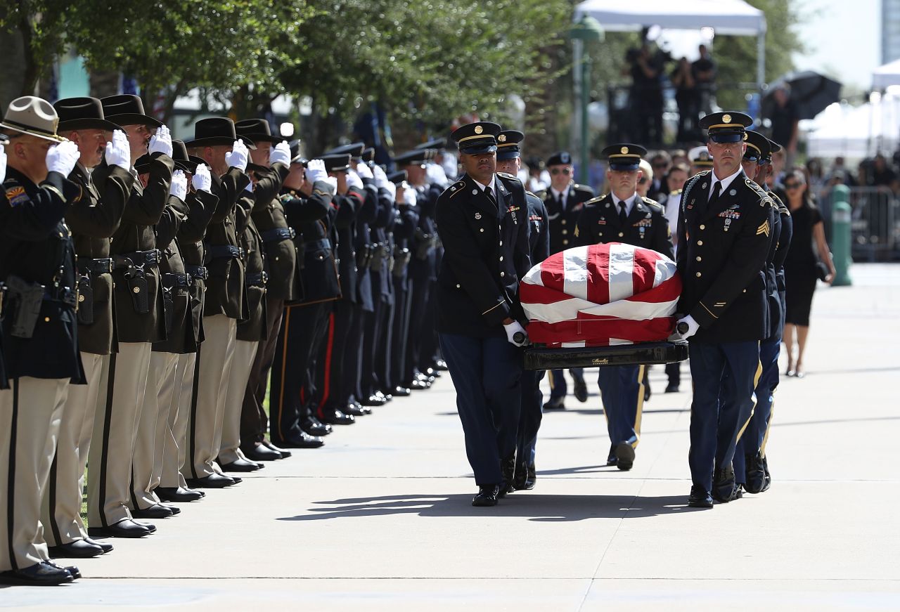 McCain's casket is carried into the Arizona State Capitol.