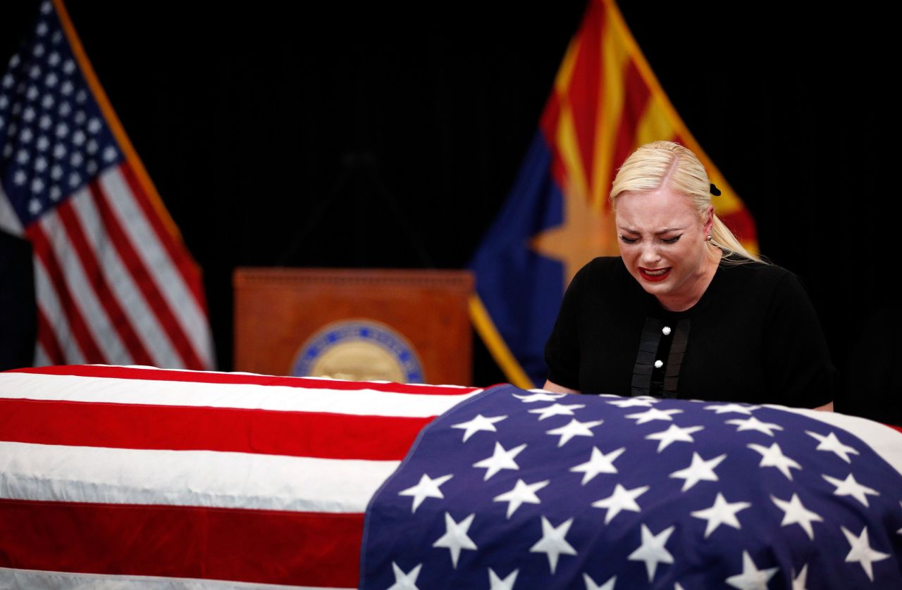 Meghan McCain cries next to her father's casket during a memorial service at the Arizona State Capitol on Wednesday.