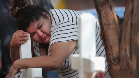 Amber Ayala mourns the loss of 10 kids killed in a Chicago house fire Sunday. 