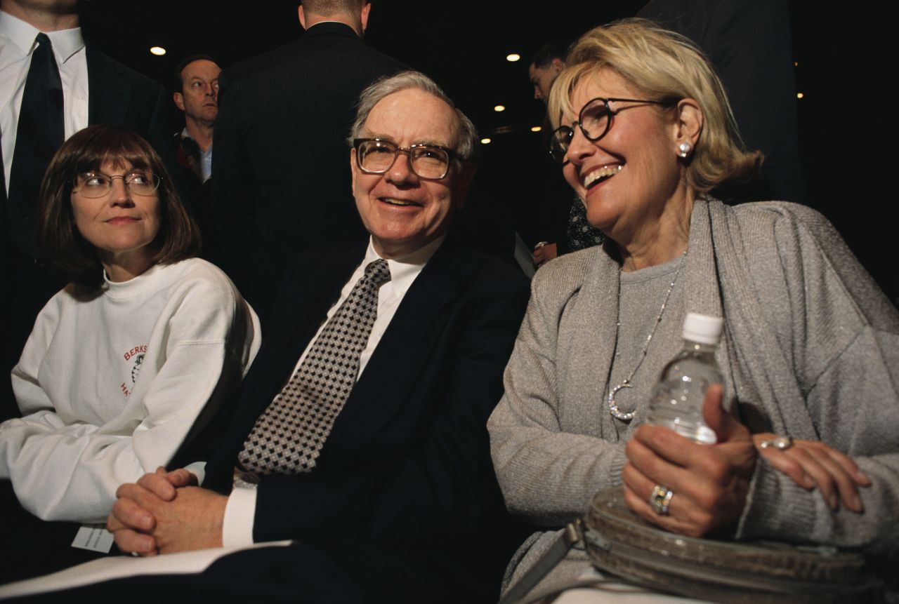 Buffett attends one of Berkshire's annual shareholders meeting. Seated with him here are his daughter Susan, left, and his wife Susan. Buffett's wife died in 2004.