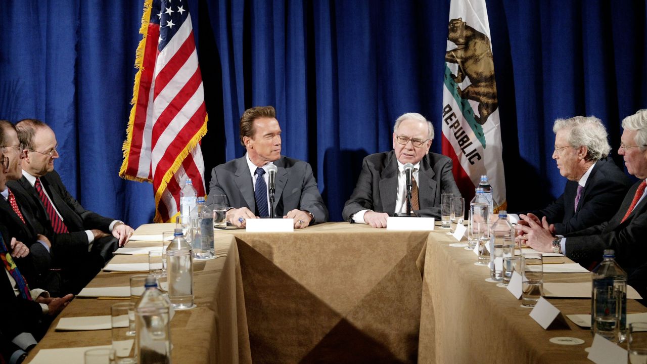 Buffett joins California Gov. Arnold Schwarzenegger during a meeting of Wall Street investors in New York in 2004. Buffett advised Schwarzenegger's gubernatorial campaign in 2003.