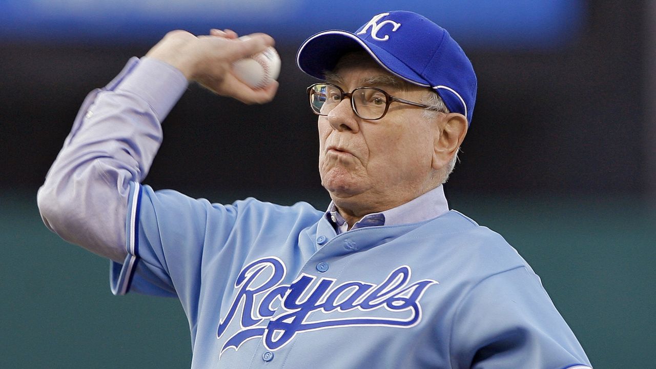 Buffett throws out the first pitch before a Kansas City Royals baseball game in 2008.