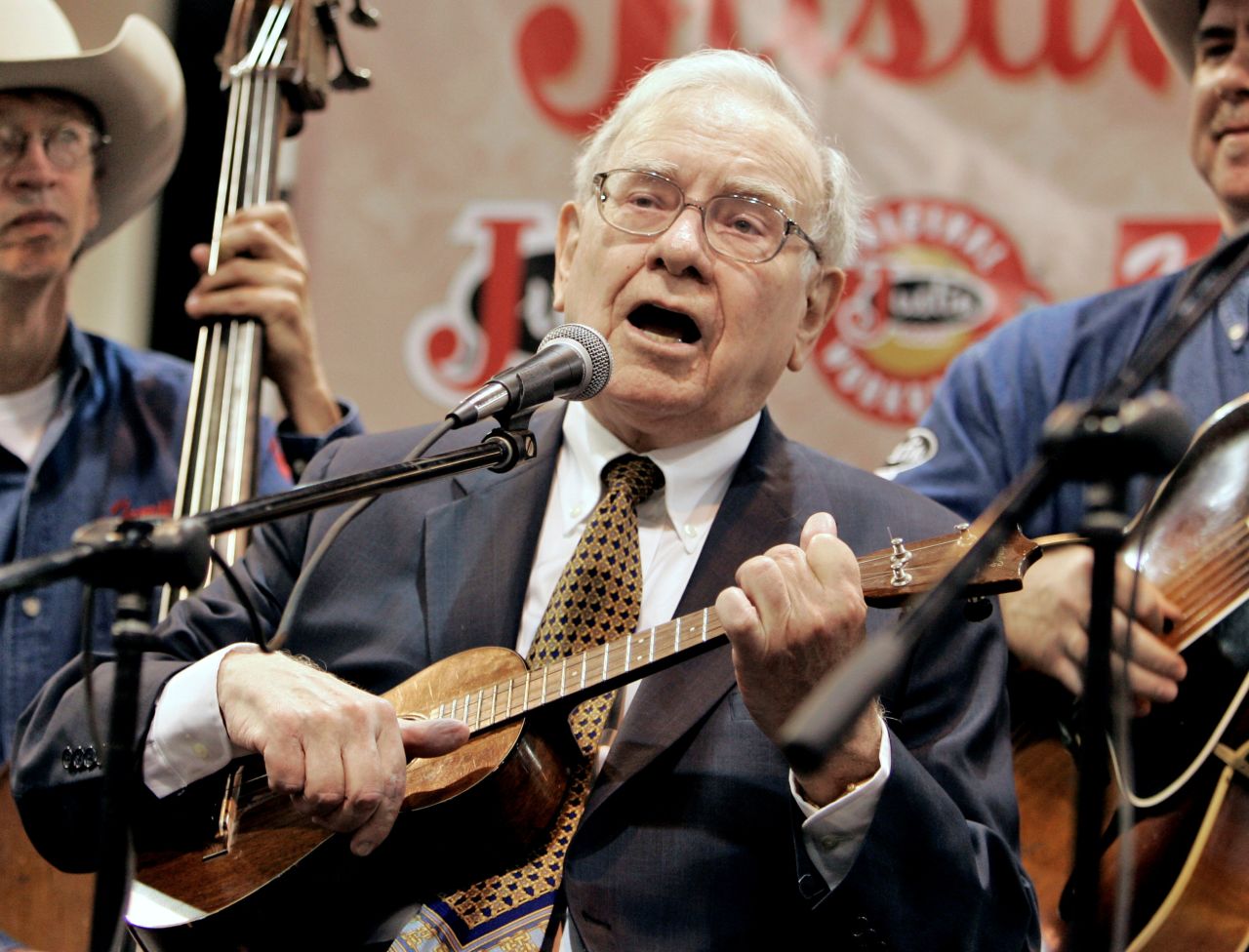 Buffett plays the ukulele with a band during the Berkshire Hathaway meeting in 2007. He learned the instrument decades ago.