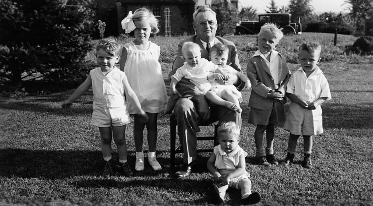 A young Buffett, far left, is seen with his grandfather, Ernest, as well as his cousins and two sisters.
