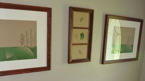 Frames hanging on the walls of the Hart family home didn't contain any family photos.