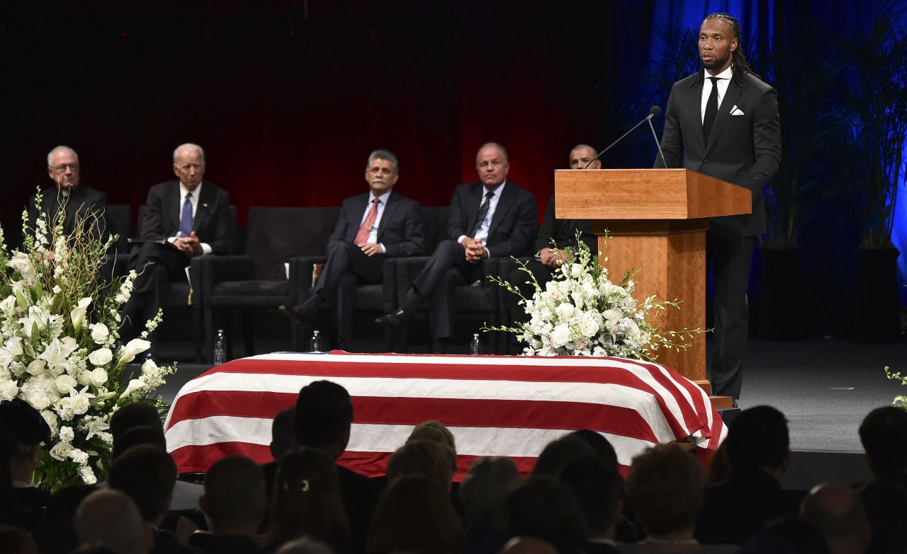 Pro football player Larry Fitzgerald, a friend of McCain's, speaks at the late senator's memorial service on Thursday. McCain "didn't judge individuals based on the color of their skin, their gender, their backgrounds, their political affiliations, or their bank accounts," Fitzgerald said. "He evaluated them on the merits of their character and the contents of their hearts."