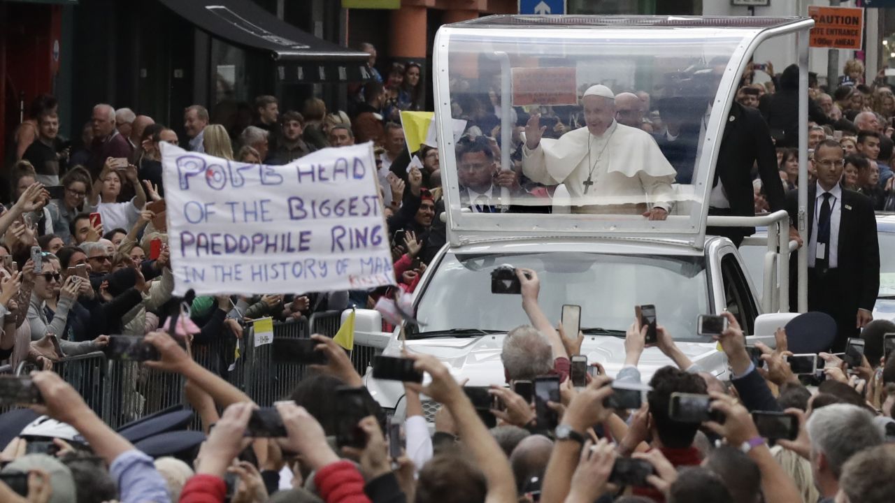 Pope Francis passes by a protester's banner during a visit to Dublin, Ireland, on Saturday, August 25. It was <a href="https://www.cnn.com/2018/08/25/photos/gallery/pope-francis-ireland/index.html" target="_blank">the first papal visit to Ireland in almost 40 years, </a>and it came amid one of the worse sexual-abuse scandals the church has faced. During his two-day visit, the Pope spoke of his shame over historic child abuse in the Catholic Church. He said <a href="https://www.cnn.com/2018/08/25/europe/pope-francis-ireland-visit-intl/index.html" target="_blank">outrage was justified.</a>