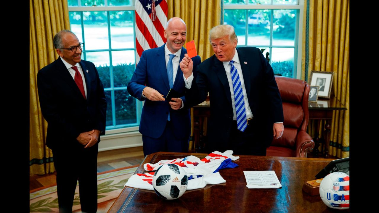 US President Donald Trump <a href="https://bleacherreport.com/articles/2793141-donald-trump-jokingly-gives-media-a-red-card-during-meeting-with-fifa-president" target="_blank" target="_blank">holds up a red card to the media in the White House Oval Office</a> as he meets with FIFA President Gianni Infantino on Tuesday, August 28. In soccer, a red card is shown to players who are ejected from the match.