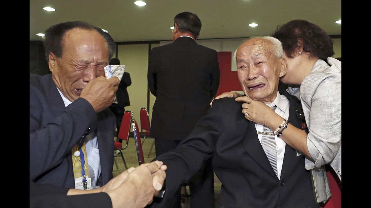 North Korean Cho Deok Yong, right, weeps with his South Korean son Cho Jeong-gi after they saw each other for the first time in decades on Friday, August 24. <a href="https://www.cnn.com/2018/08/20/asia/korea-family-reunion-intl/index.html" target="_blank">The temporary family reunions</a> were agreed as part of the Panmunjom Declaration, which was signed by the leaders of North and South Korea during their <a href="https://www.cnn.com/interactive/2018/04/world/korea-summit-cnnphotos/" target="_blank">historic summit</a> earlier this year.