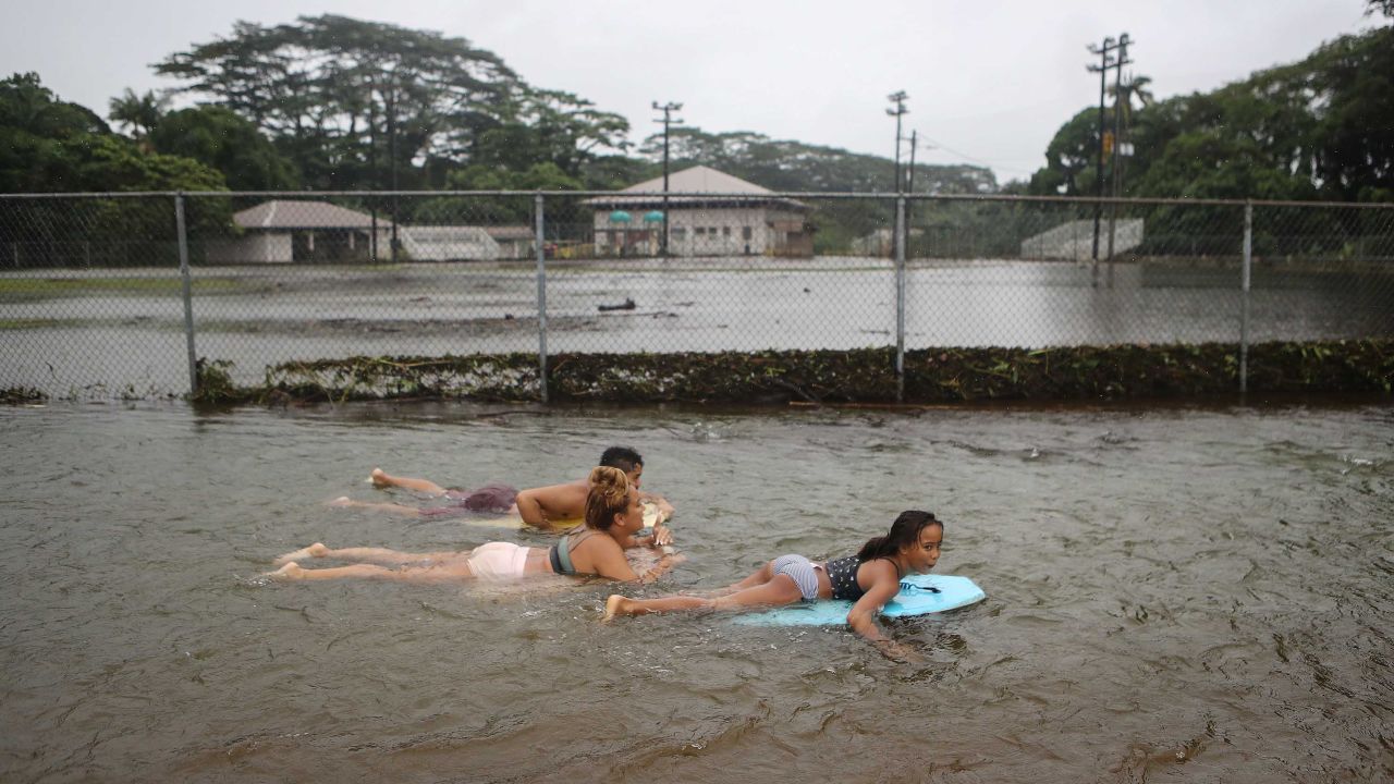 People float on bodyboards after Hurricane Lane flooded a baseball field in Hilo, Hawaii, on Saturday, August 25. <a href="https://www.cnn.com/2018/08/28/us/hawaii-tropical-storm-lane-flooding-wxc/index.html" target="_blank">The storm dropped 52.02 inches of rain on Hawaii</a> from August 22-26. In the United States, that's the second-most rainfall from a tropical cyclone since 1950, according to preliminary data from the National Weather Service.