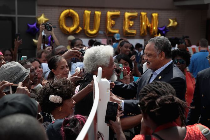 Jesse Jackson greets Aretha Franklin fans outside the New Bethel Baptist Church.