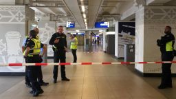 Security officials cordon off an area inside the Central Railway Station in Amsterdam.