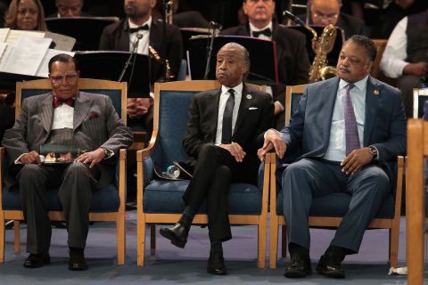 From left, Louis Farrakhan, the Rev. Al Sharpton and the Rev. Jesse Jackson attend Franklin's funeral.
