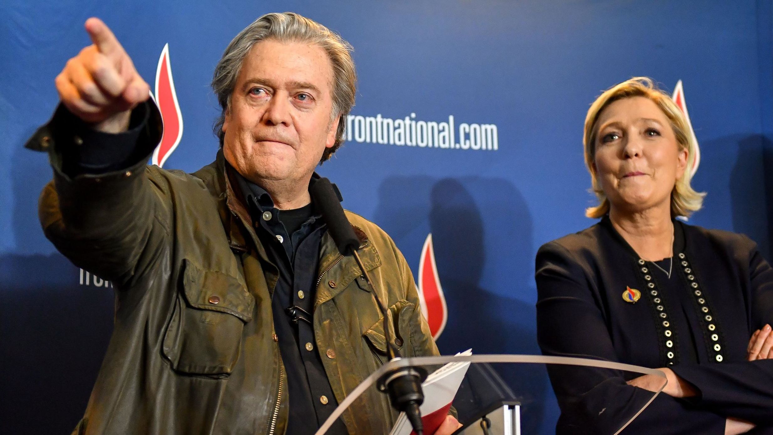 Steve Bannon, left, with France's far-right leader Marine Le Pen after giving a speech at her party's annual congress on March 10, 2018 in Lille, France.