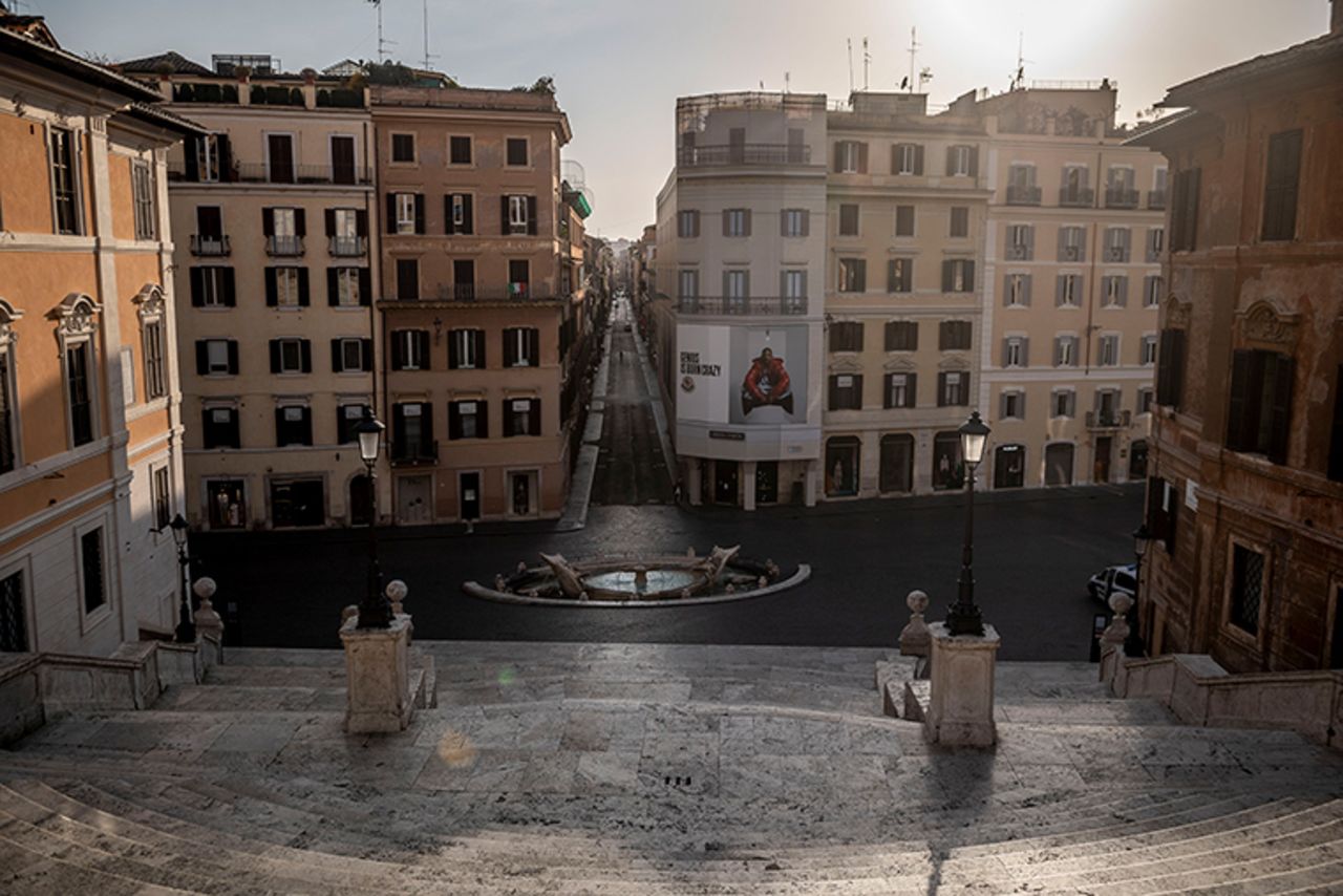 A general view of Spanish Square area and Via dei Condotti empty of tourists on Monday, March 30, in Rome.