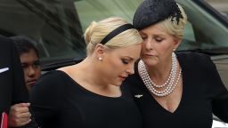 WASHINGTON, DC - SEPTEMBER 1: Meghan McCain and her mother Cindy McCain embrace as the casket of the late Senator John McCain arrives at the Washington National Cathedral for the funeral service for McCain, September 1, 2018 in Washington, DC. Former presidents Barack Obama and George W. Bush are set to deliver eulogies for McCain in front of the 2,500 invited guests. McCain will be buried on Sunday at the U.S. Naval Academy Cemetery. (Photo by Drew Angerer/Getty Images)