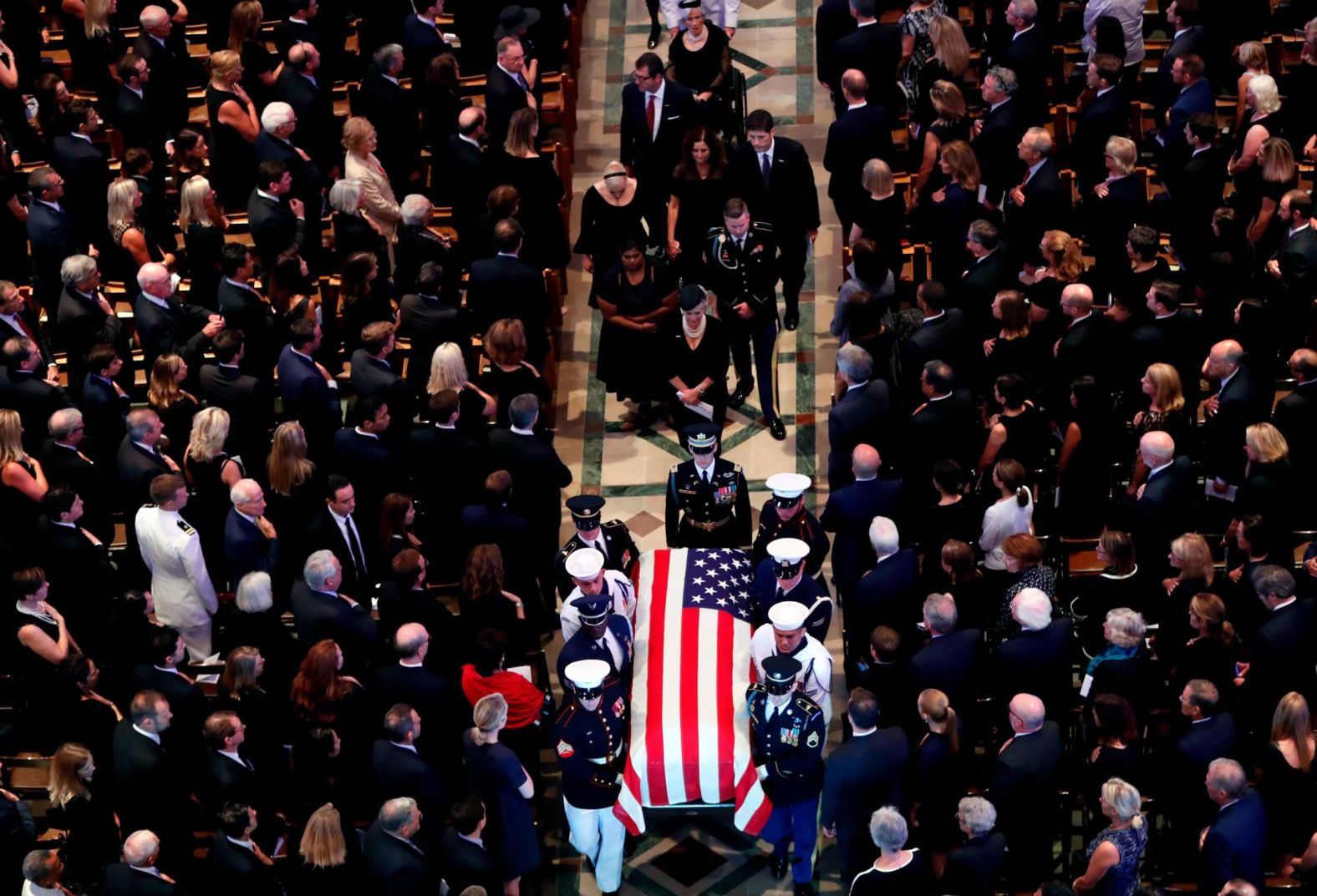 McCain's casket is carried out of the National Cathedral at the end of Saturday's service.