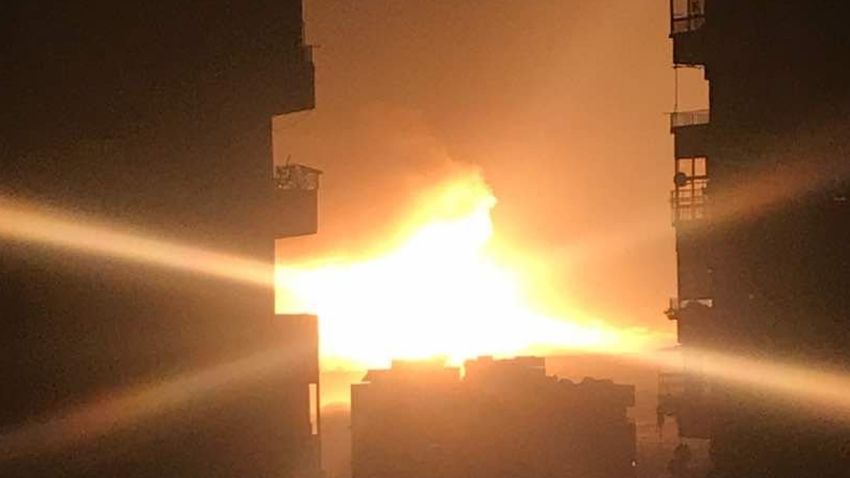 Syrian state media citing an unnamed military source is denying that an airbase near Damascus was hit by Israeli airstrikes overnight Saturday, saying instead that a series of explosions were caused instead by an electrical fault at an ammunitions depot in the area.