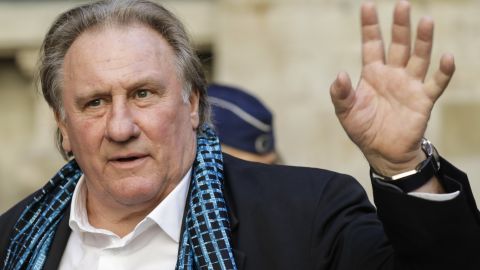 French actor Gerard Depardieu waves as he arrives at the Town Hall  in Brussels for a ceremony as part of the 'Brussels International Film Festival' (Briff) on June 25, 2018. (Photo by THIERRY ROGE / BELGA / AFP) / Belgium OUT