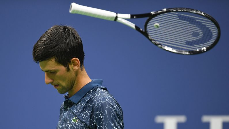 Serbia's Novak Djokovic tosses his racket while playing against Tennys Sandgren of the United States during the US Open on Thursday, August 30.