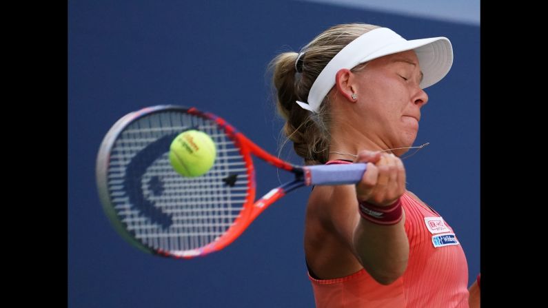 Johanna Larsson of Sweden plays against Angelique Kerber of Germany during the US Open women's singles match on Thursday, August 30.