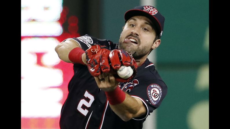 Washington Nationals right fielder Adam Eaton catches a fly ball hit by Milwaukee Brewers' Lorenzo Cain during the fifth inning of a baseball game at Nationals Park on Friday, August 31.