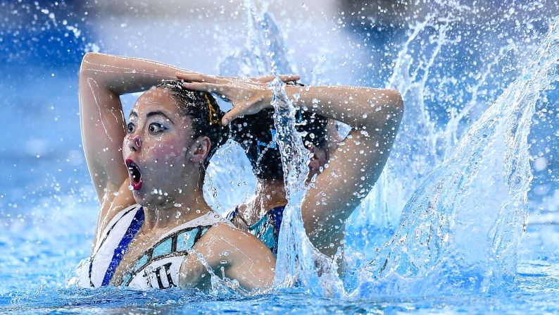 Japan's Inui Yukiko and Yoshida Megumu compete during the synchronized swimming duets on Tuesday, August 28.