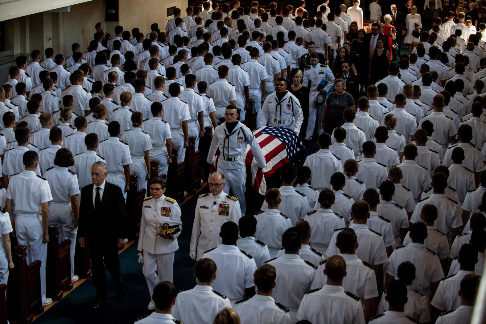 McCain's casket is carried out of the chapel Sunday.