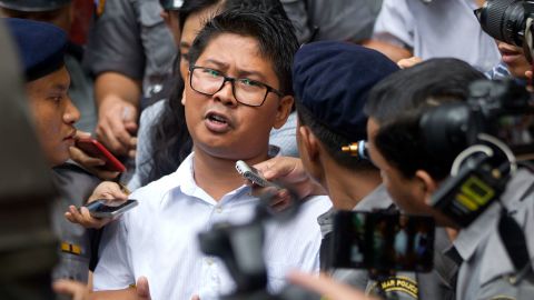 Wa Lone is escorted out of court by police on Monday.
