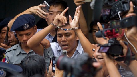 Kyaw Soe Oo speaks to journalists as he leaves court on Monday.