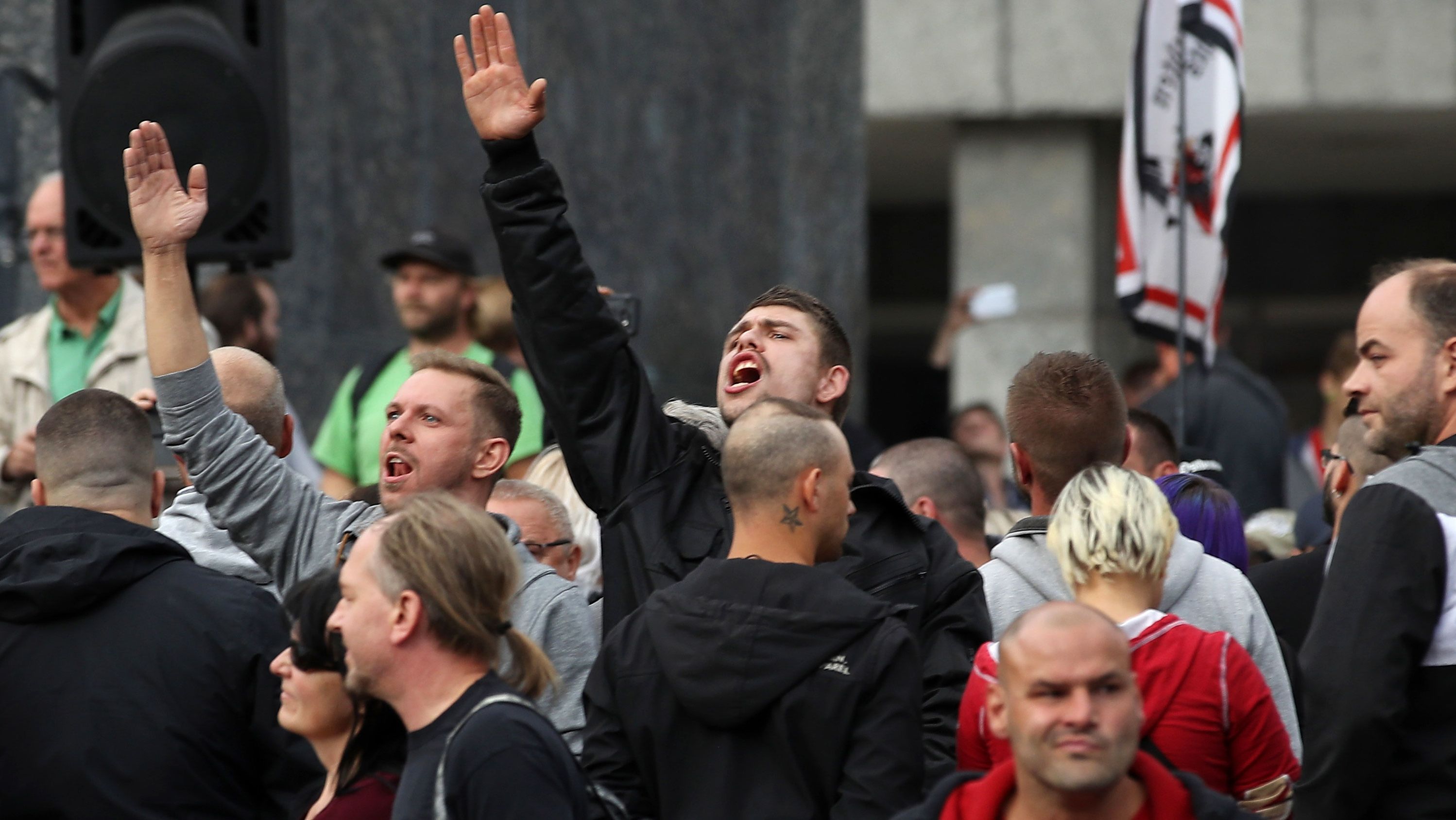  A man raises his arm in a Heil Hitler salute at a protest in Chemnitz last Monday.