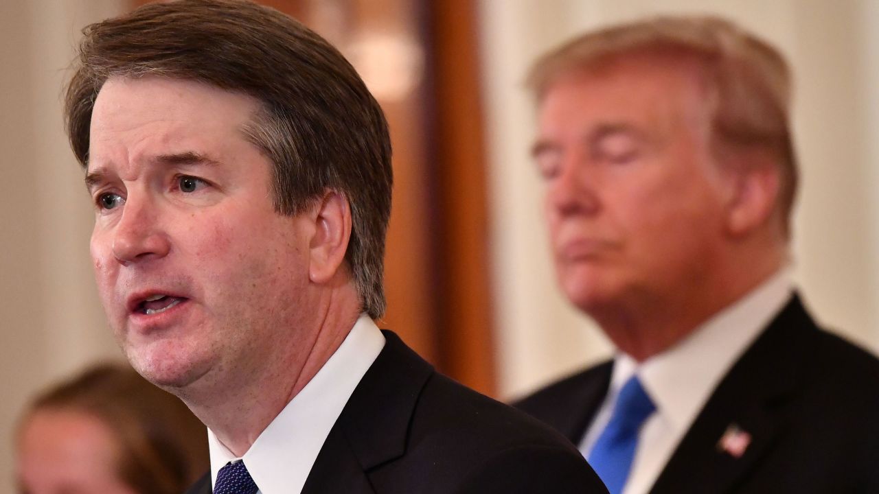 Supreme Court nominee Brett Kavanaugh (L) speaks as US President Donald Trump listens after he announced his nomination in the East Room of the White House on July 9, 2018 in Washington, DC. (Photo by MANDEL NGAN / AFP)        (Photo credit should read MANDEL NGAN/AFP/Getty Images)