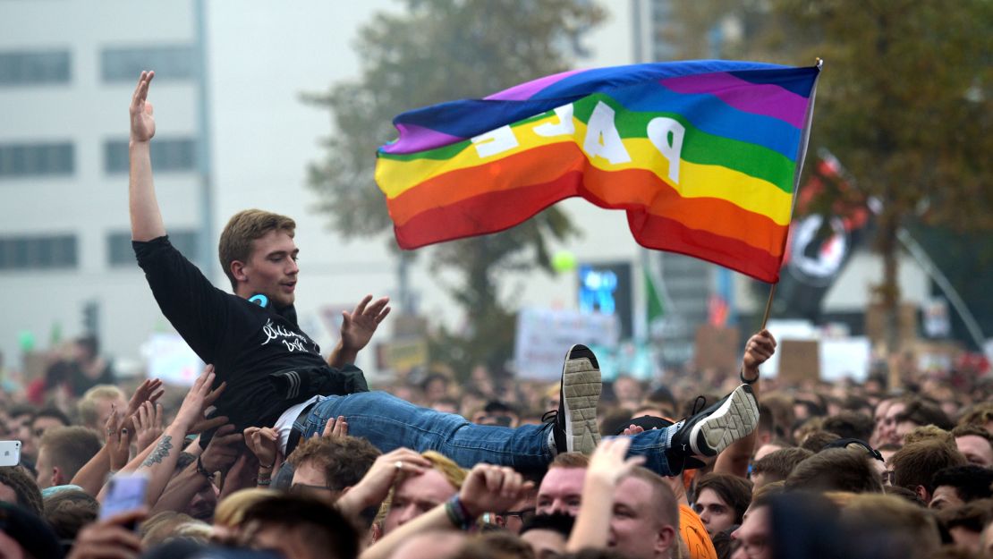 A man crowsurfs at the concert in Chemnitz on Monday. 