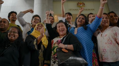 Transgender activists celebrate outside the court of appeals in Putrajaya in 2014, when three Malaysian transgender women on November 7 won their landmark bid to overturn an Islamic anti-cross dressing law.