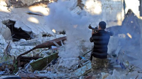 A member of the self-styled Libyan National Army, loyal to Khalifa Haftar, fires a rocket in Benghazi on November 9, 2017.