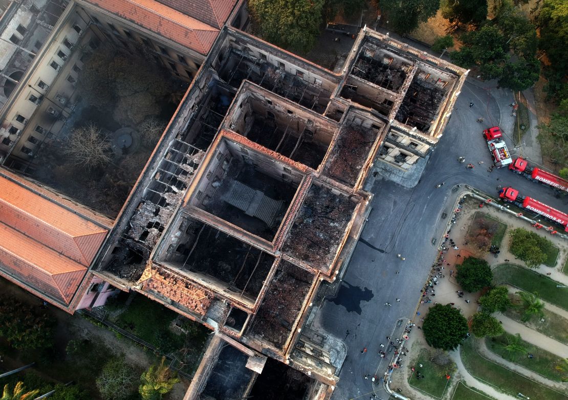 An aerial view of Rio de Janeiro's treasured National Museum a day after a massive fire ripped through the building.