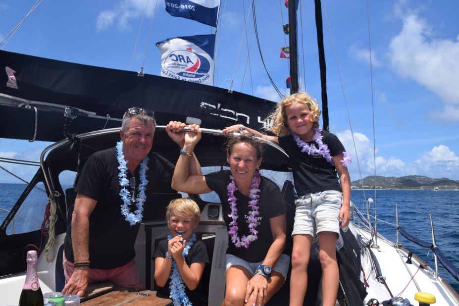 The Wennberg family celebrate as they cross the finish line of the World ARC in St. Lucia, in the Eastern Caribbean. 