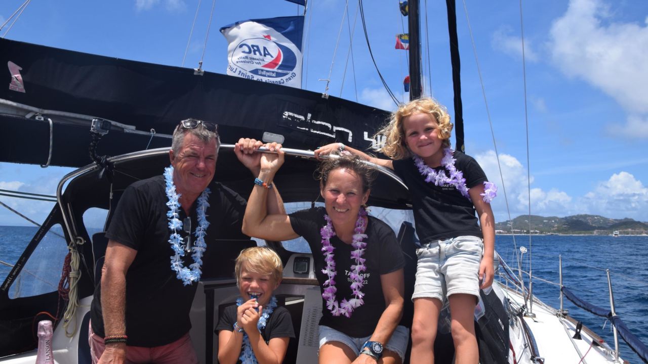 The Wennberg family celebrate as they cross the finish line of the World ARC in St. Lucia, in the Eastern Caribbean. 